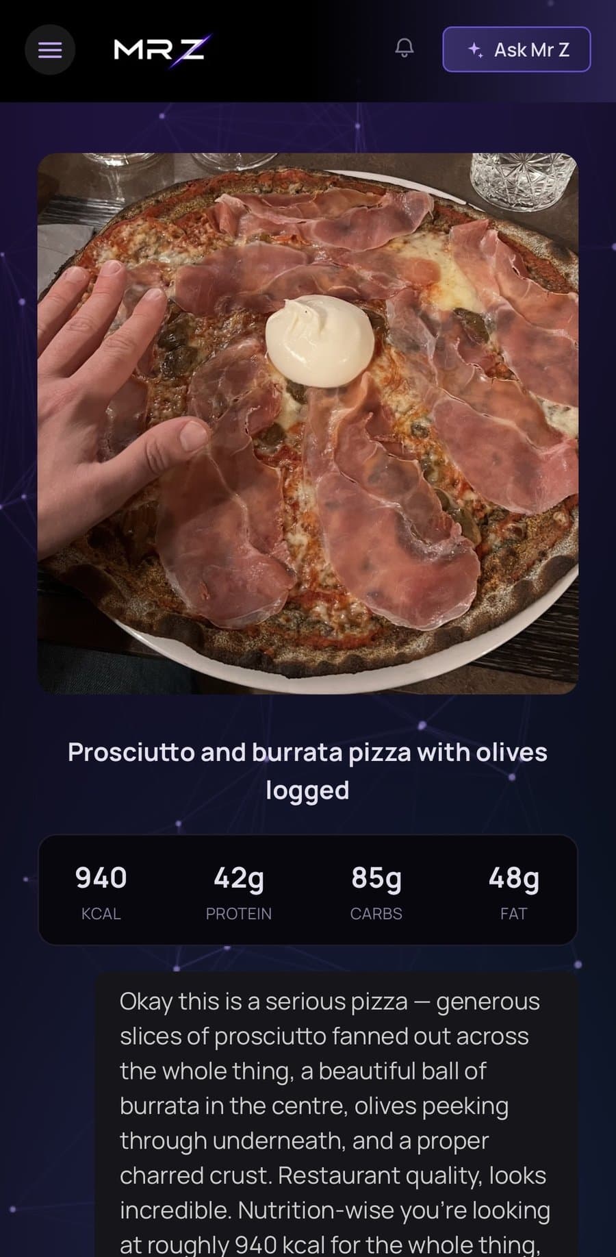 A photographed pizza logged with its analysed calories, protein, carbs and fat